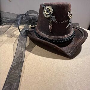 Madd Hatter mini steampunk brown stiff felt hat. attached hair clip.